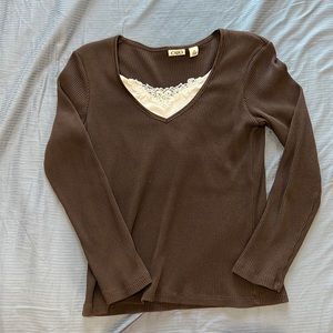 Cute long sleeve top with neck details!
